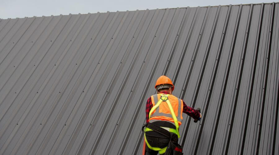 Professional metal roof installation services in Holcomb, IL